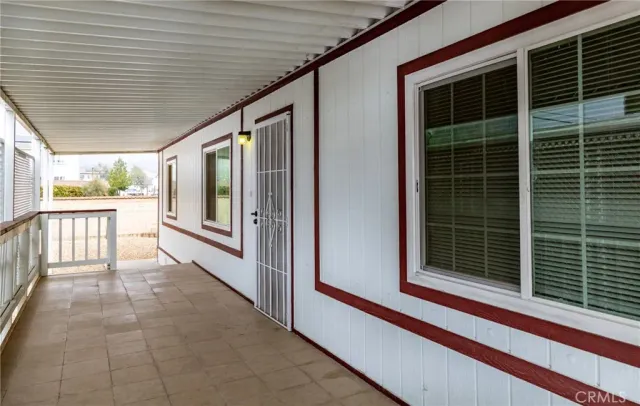 a view of a hallway with staircase