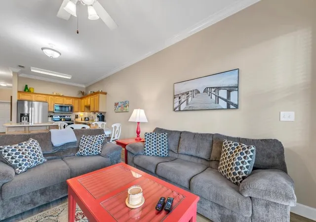 a living room with furniture and a couch