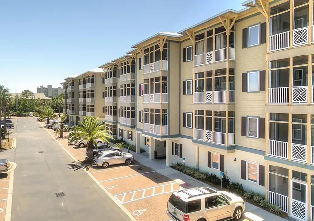 a view of a swimming pool with chairs