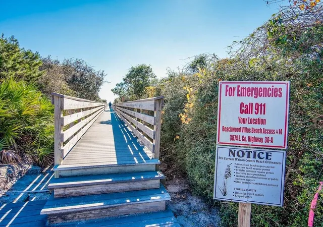 a view of a yard with an ocean view