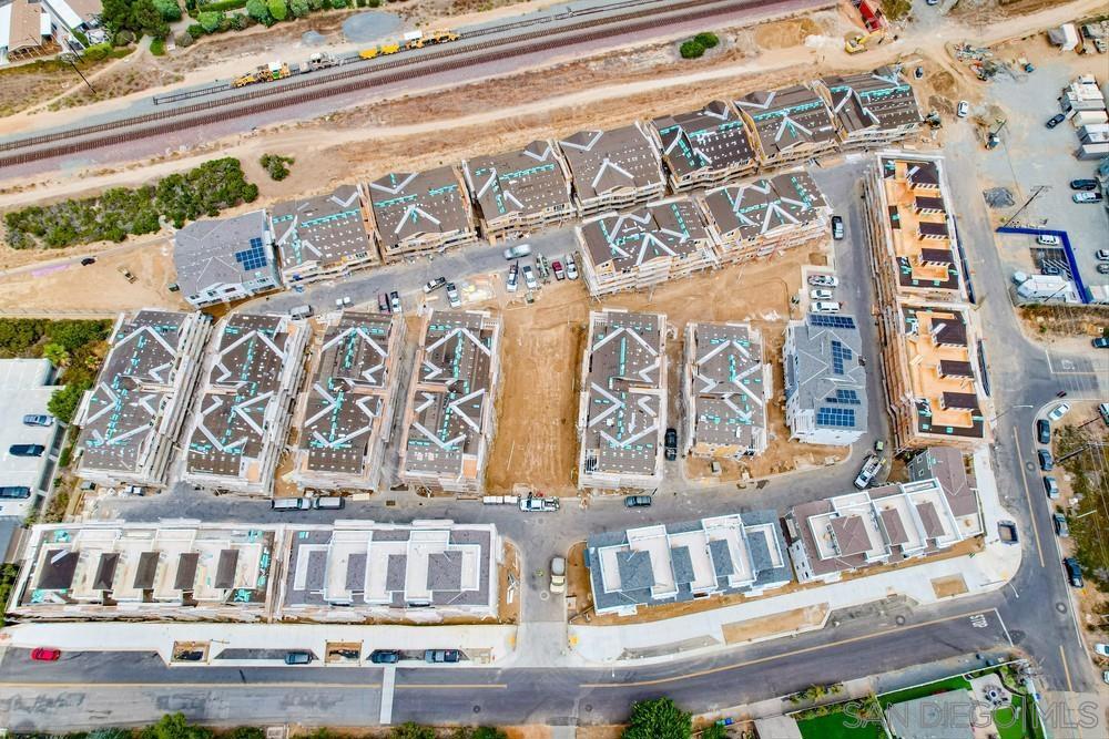 7504 Ponto Road Carlsbad, CA 92011 - Photo 13 of 24 a building with an outdoor space