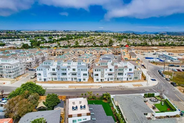 a view of a city with an ocean view