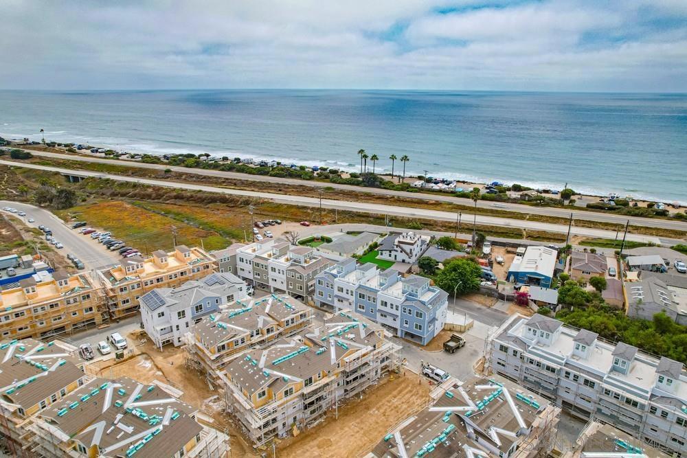 7504 Ponto Road Carlsbad, CA 92011 - Photo 10 of 24 a view of a swimming pool with an ocean view
