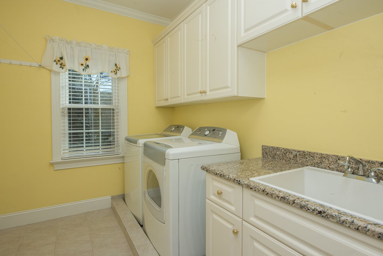 5212 Tallowtree Drive Raleigh, NC 27613 - Photo 18 of 25 I love my utility room with the tile and granite Utility