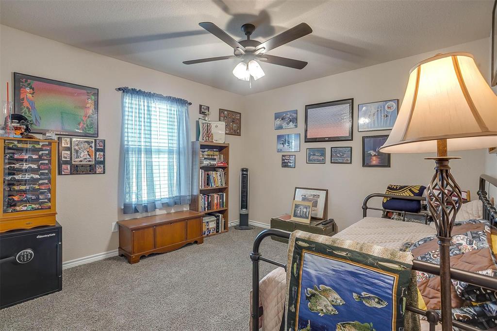 2140 Brown Loop Poolville, TX 76487 - Photo 22 of 38 a living room with furniture and a window