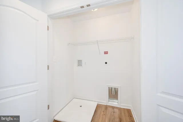 a view of empty room with windows