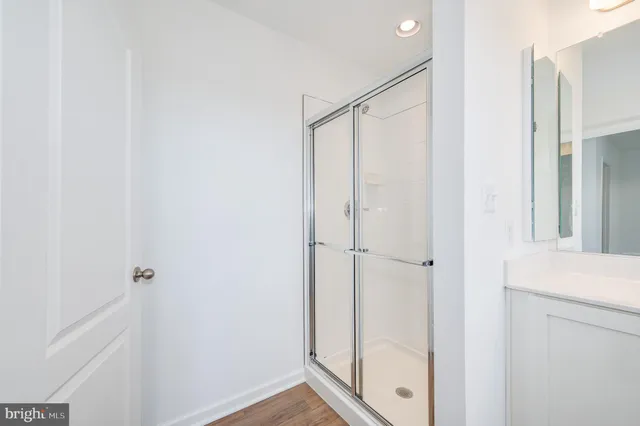 a small white house with a outdoor space