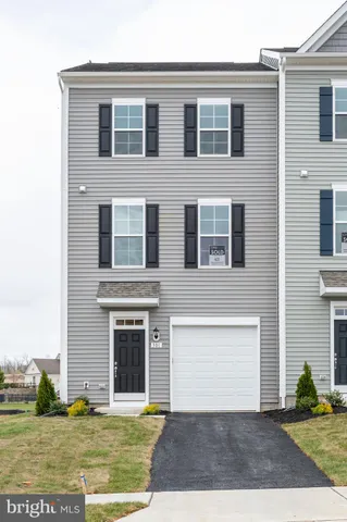 a view of entrance gate of a house