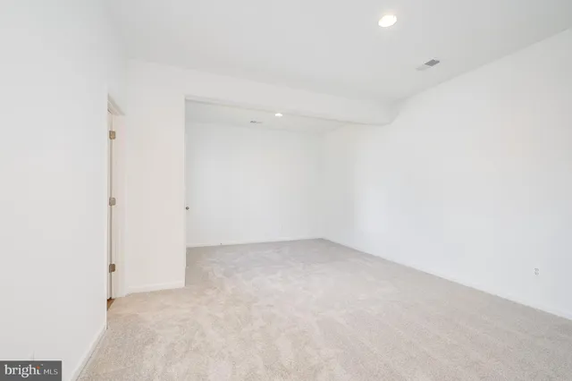 an empty room with an entryway