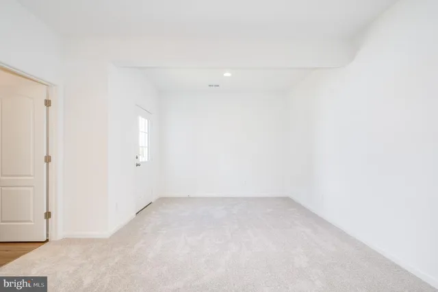 an empty room with an entryway