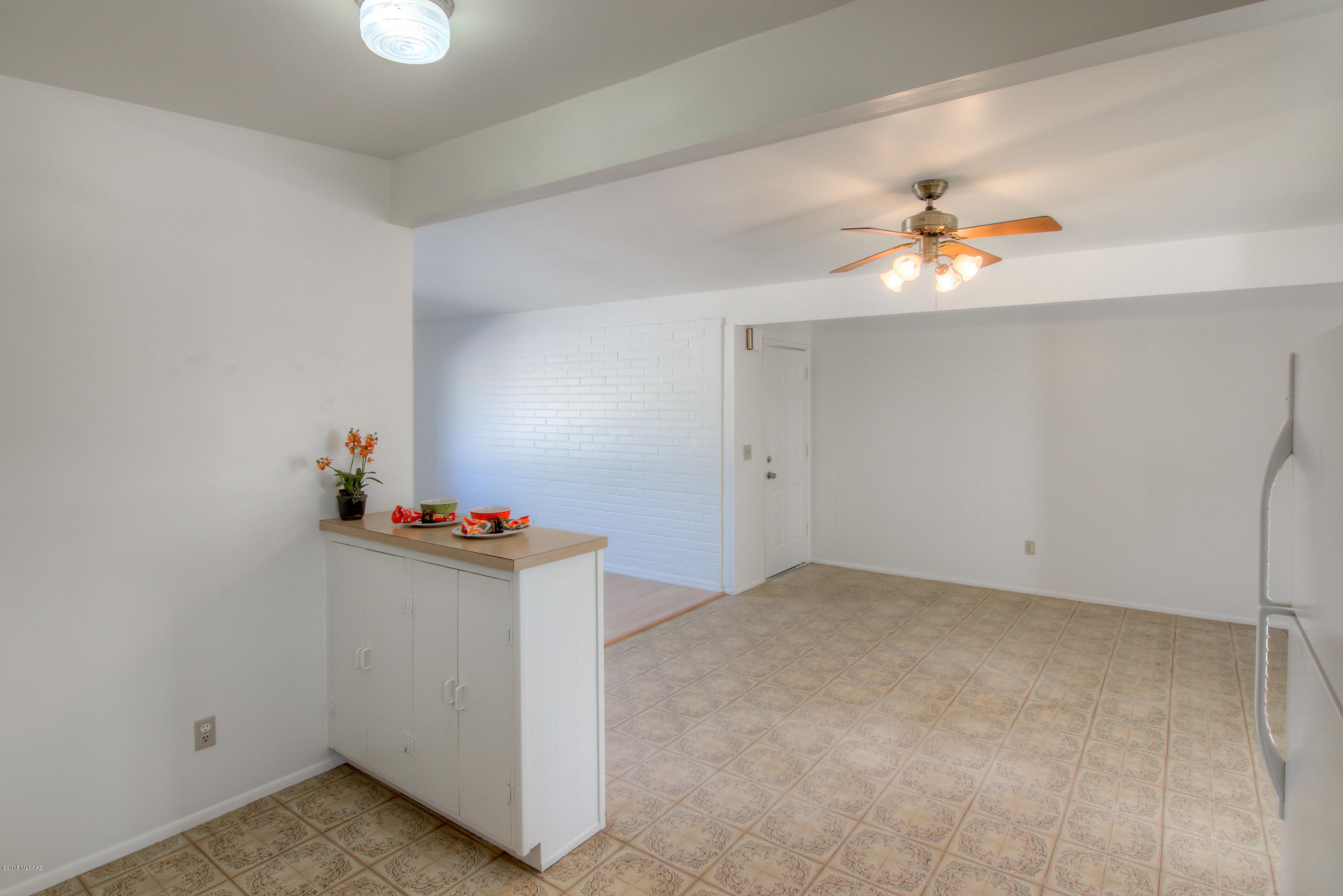 1841 West Astolat Road Tucson, AZ 85713 - Photo 26 of 40 wooden floor in an empty room