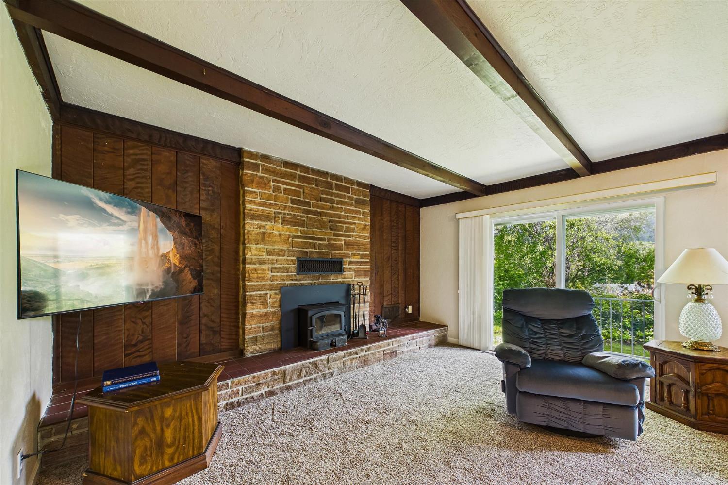 305 Belleview Avenue Rio Dell, CA 95562 - Photo 19 of 76 a living room with furniture large window and a fireplace