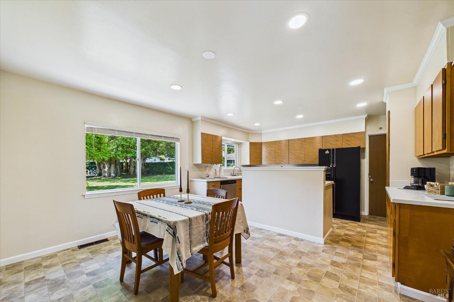 305 Belleview Avenue Rio Dell, CA 95562 - Photo 24 of 76 a kitchen with a table and chairs in it