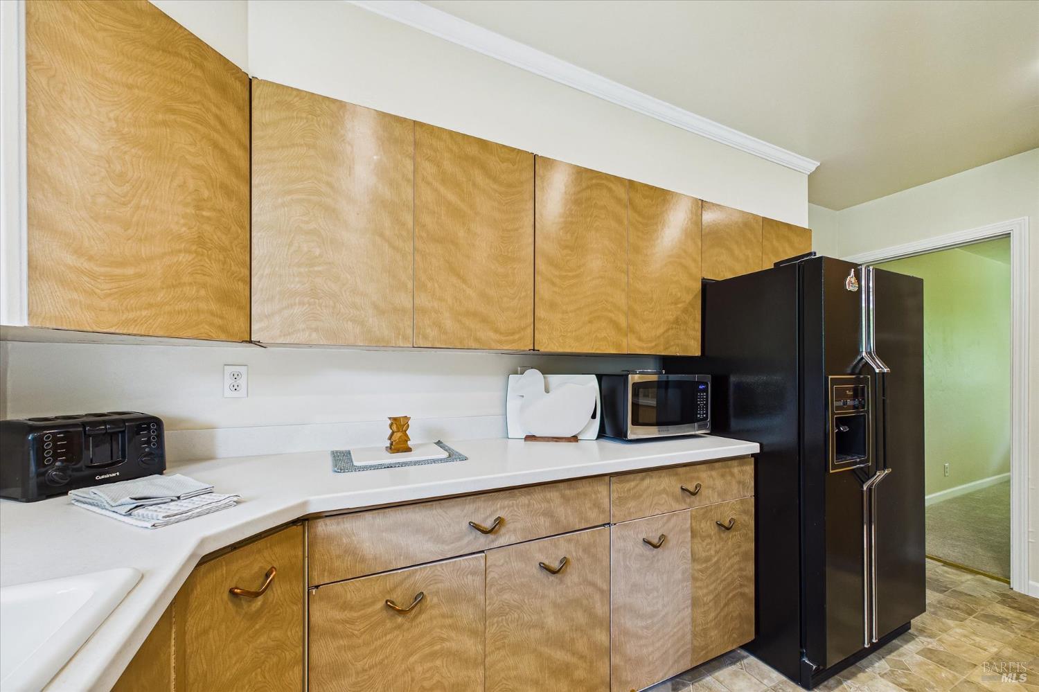 305 Belleview Avenue Rio Dell, CA 95562 - Photo 27 of 76 a kitchen with stainless steel appliances a sink cabinets and a refrigerator