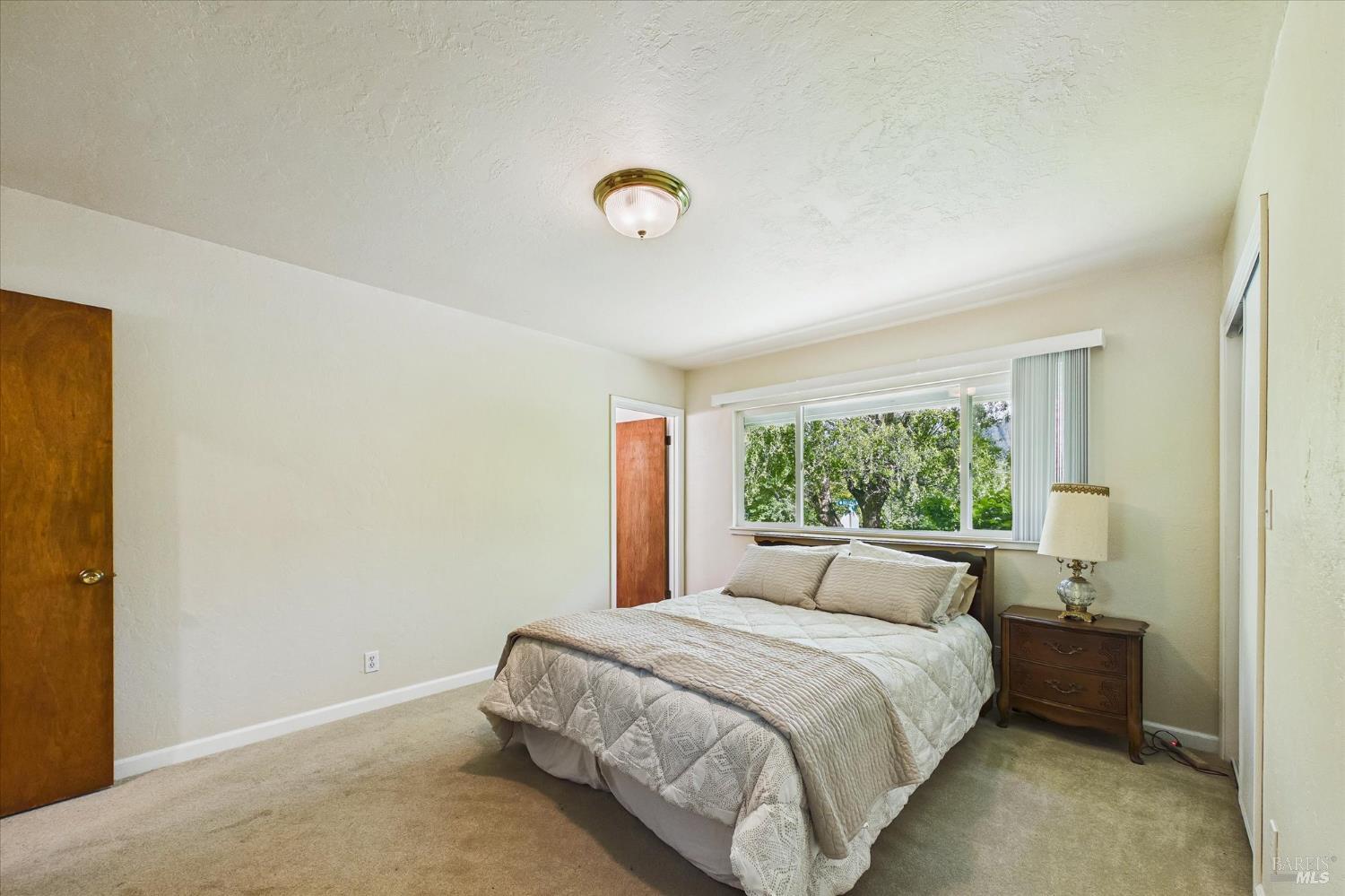 305 Belleview Avenue Rio Dell, CA 95562 - Photo 32 of 76 a bedroom with a bed and a window