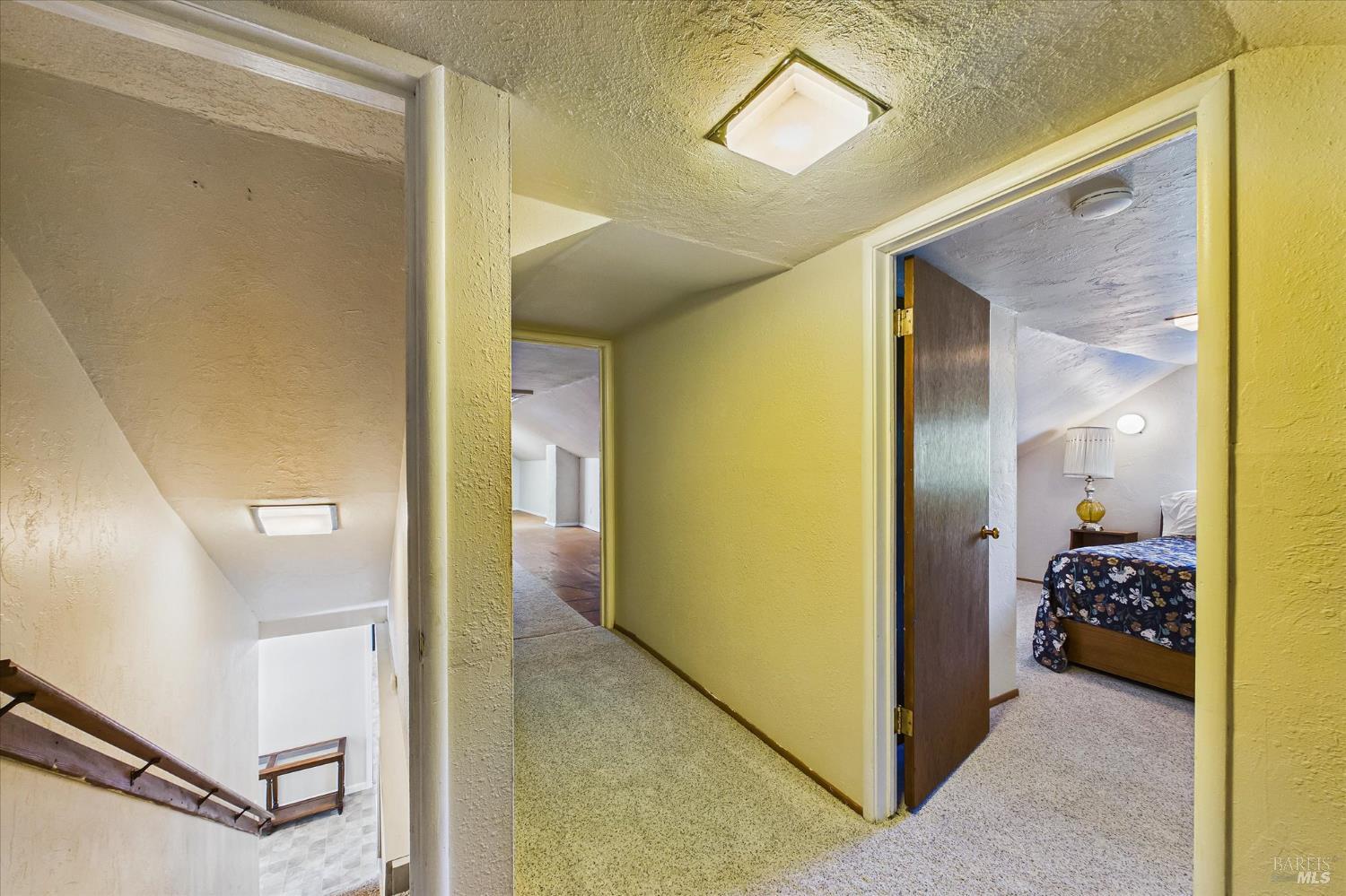 305 Belleview Avenue Rio Dell, CA 95562 - Photo 50 of 76 a view of a hallway view with wooden floor and a livingroom