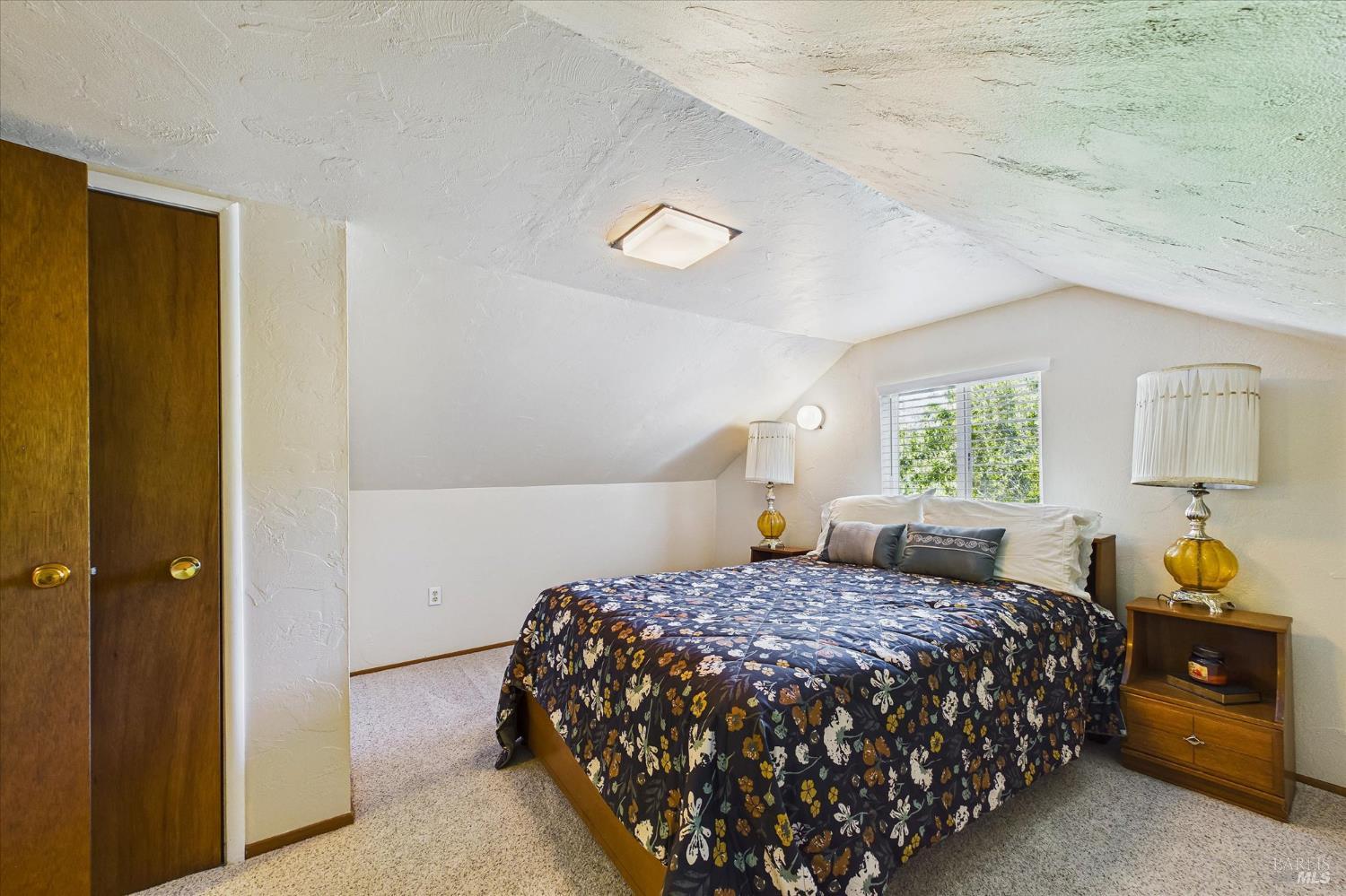 305 Belleview Avenue Rio Dell, CA 95562 - Photo 51 of 76 a bedroom with a bed and a window