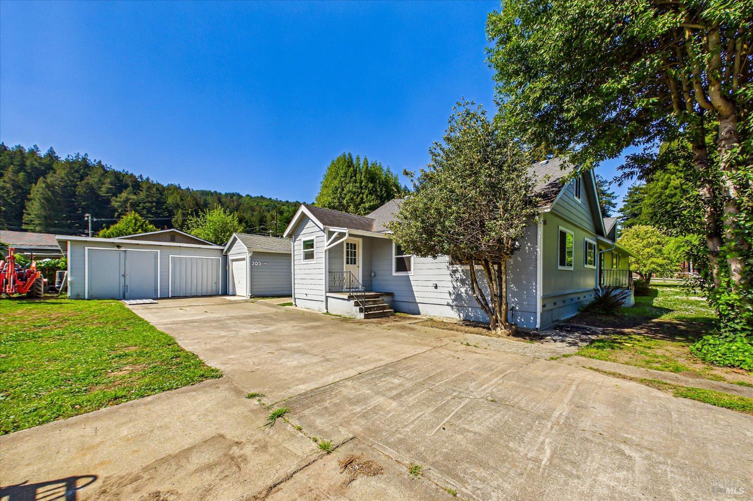 305 Belleview Avenue Rio Dell, CA 95562 - Photo 61 of 76 a view of a house with a yard