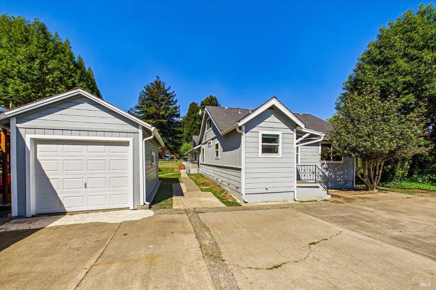 305 Belleview Avenue Rio Dell, CA 95562 - Photo 62 of 76 a view of a house with a yard and garage