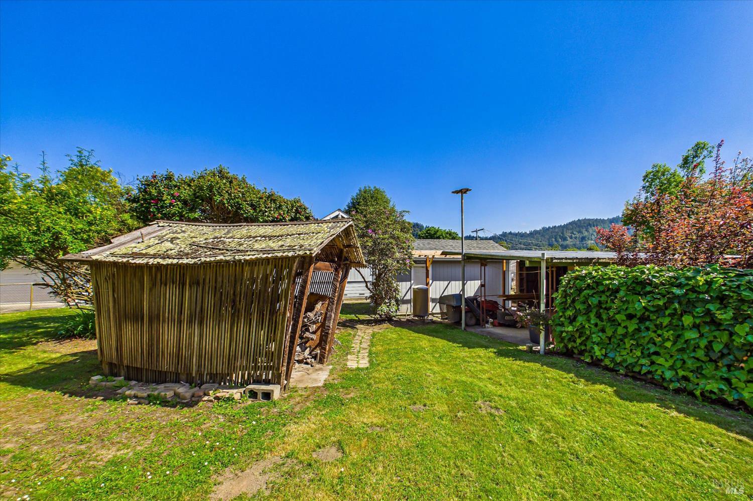 305 Belleview Avenue Rio Dell, CA 95562 - Photo 72 of 76 a view of a house with a yard porch and sitting area