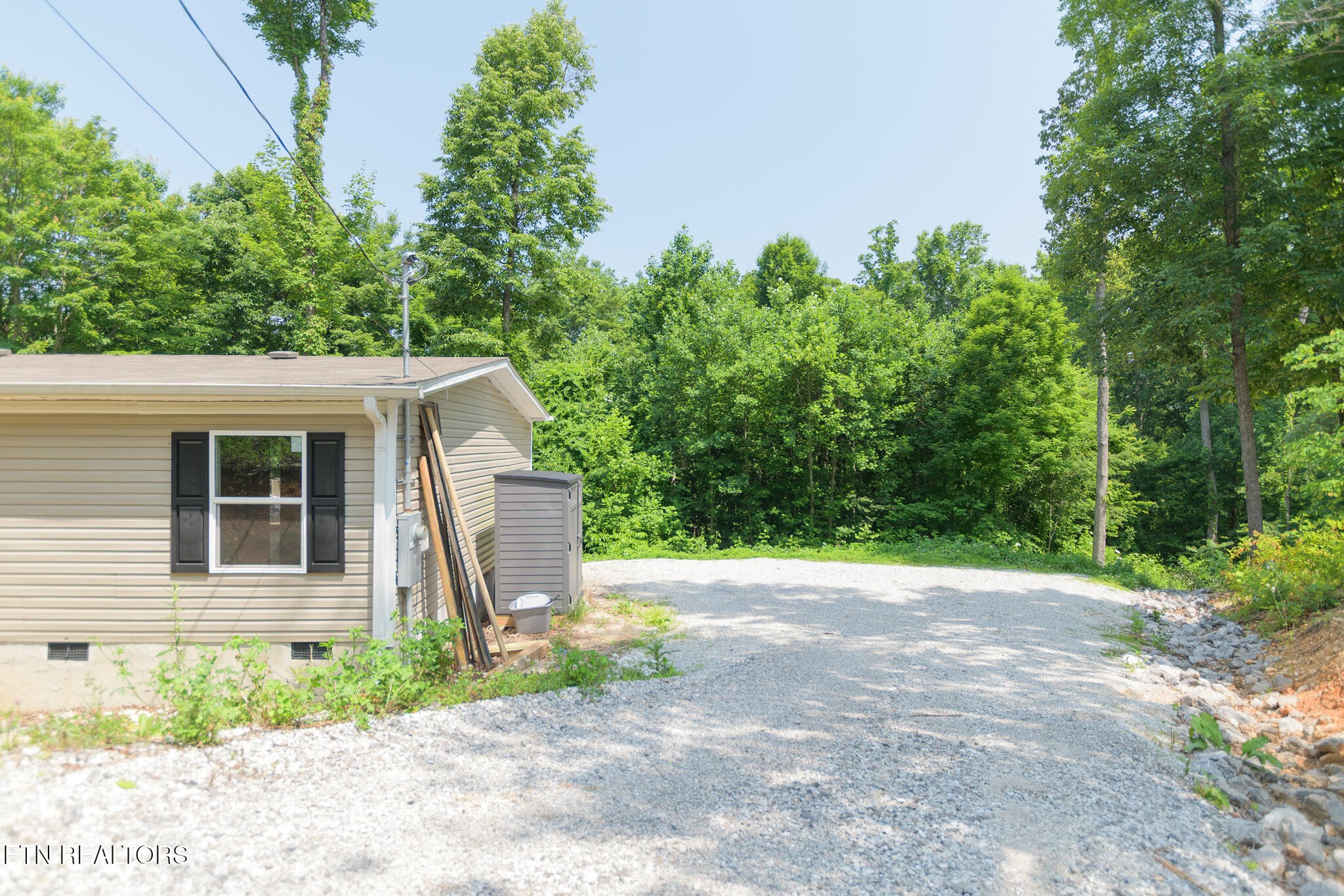 297 Wells Road Powell, TN 37849 - Photo 12 of 15 a view of a house with a yard
