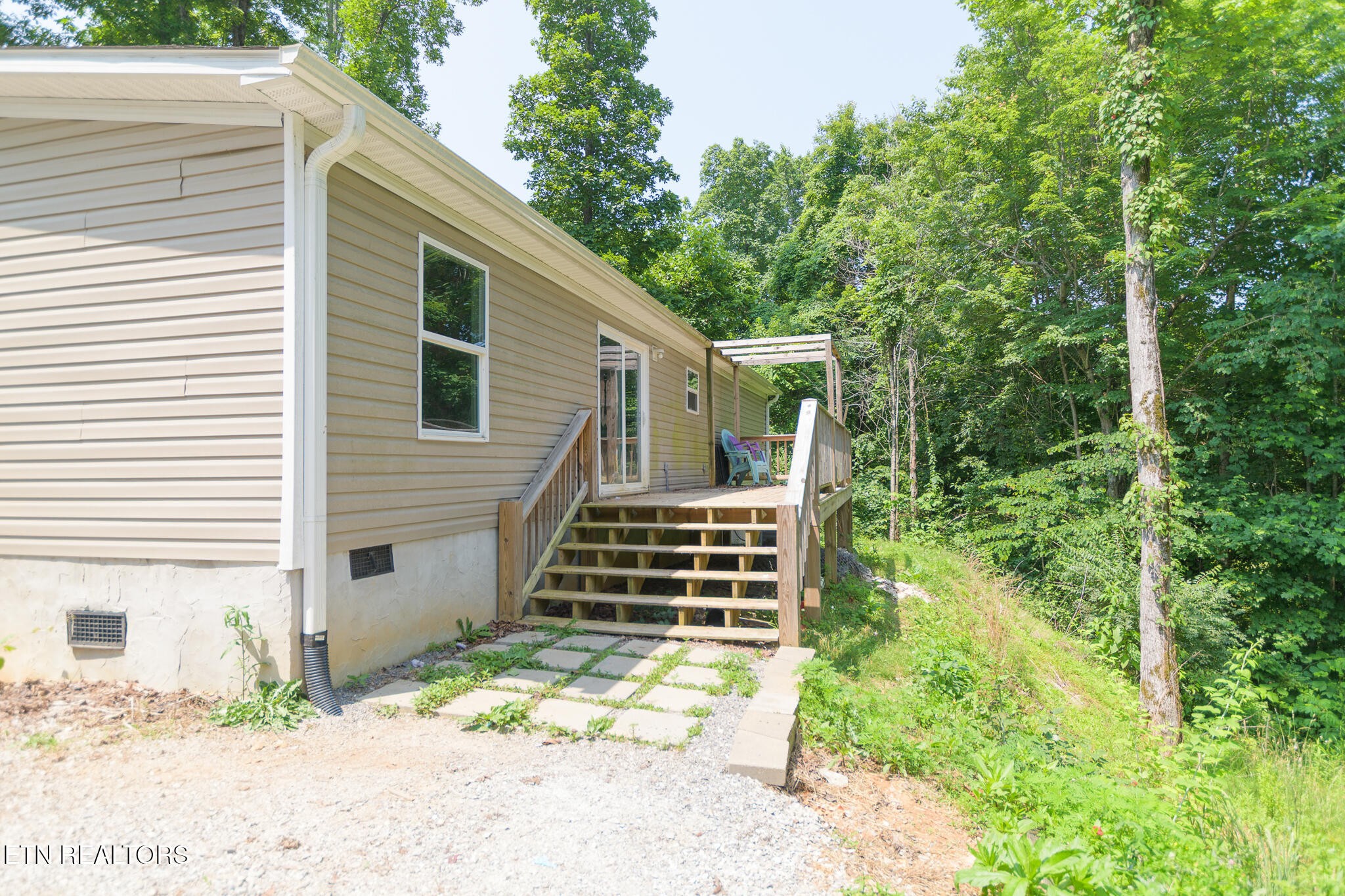 297 Wells Road Powell, TN 37849 - Photo 13 of 15 a front view of a house with a yard