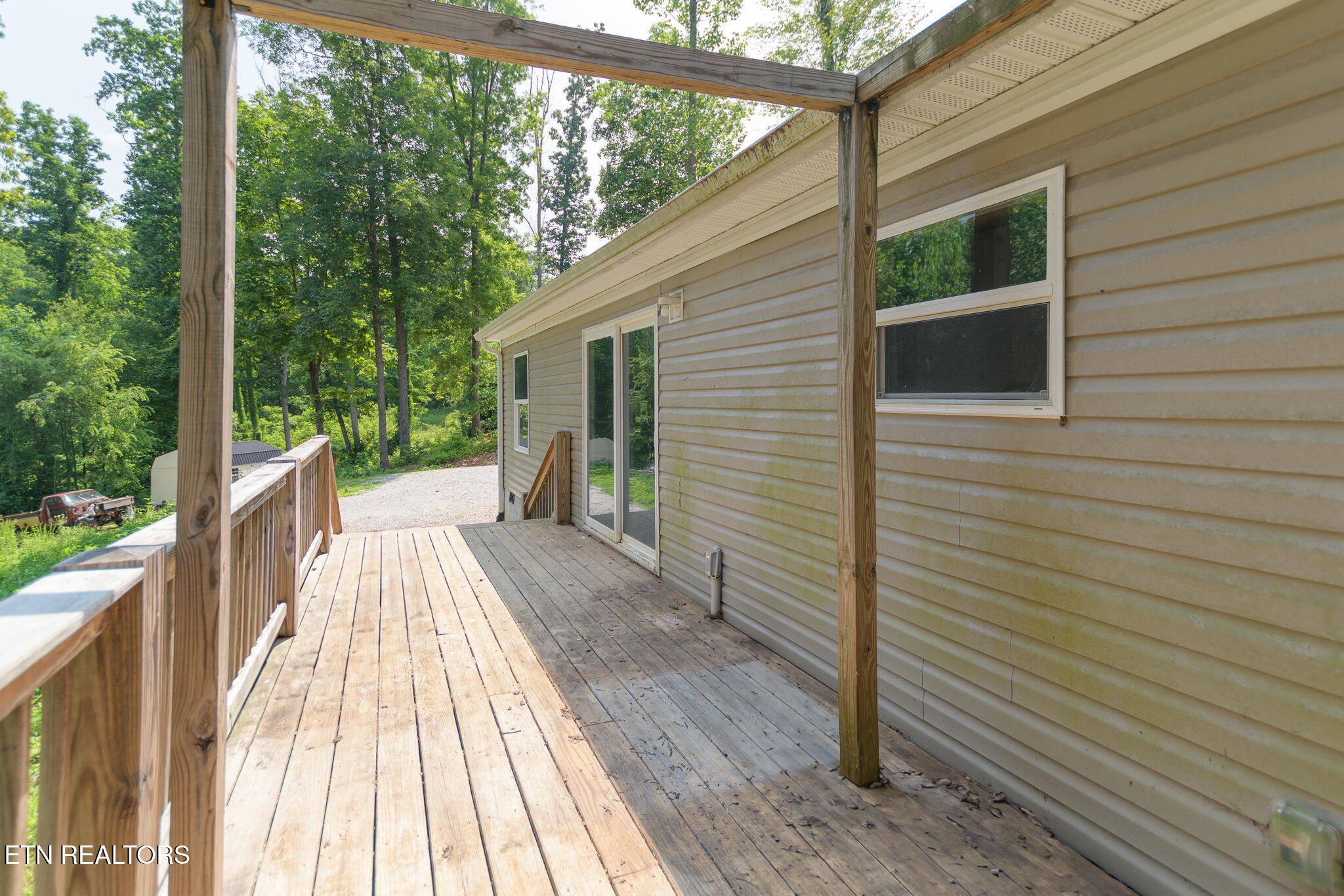 297 Wells Road Powell, TN 37849 - Photo 14 of 15 a view of balcony with wooden floor and fence