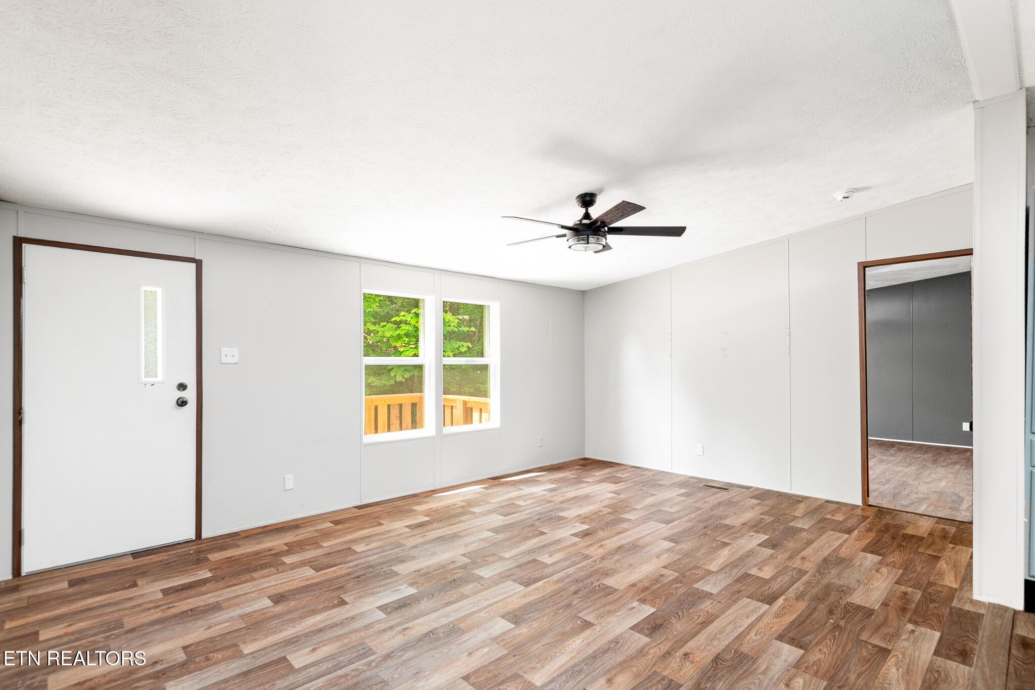 297 Wells Road Powell, TN 37849 - Photo 2 of 15 a view of an empty room with a window
