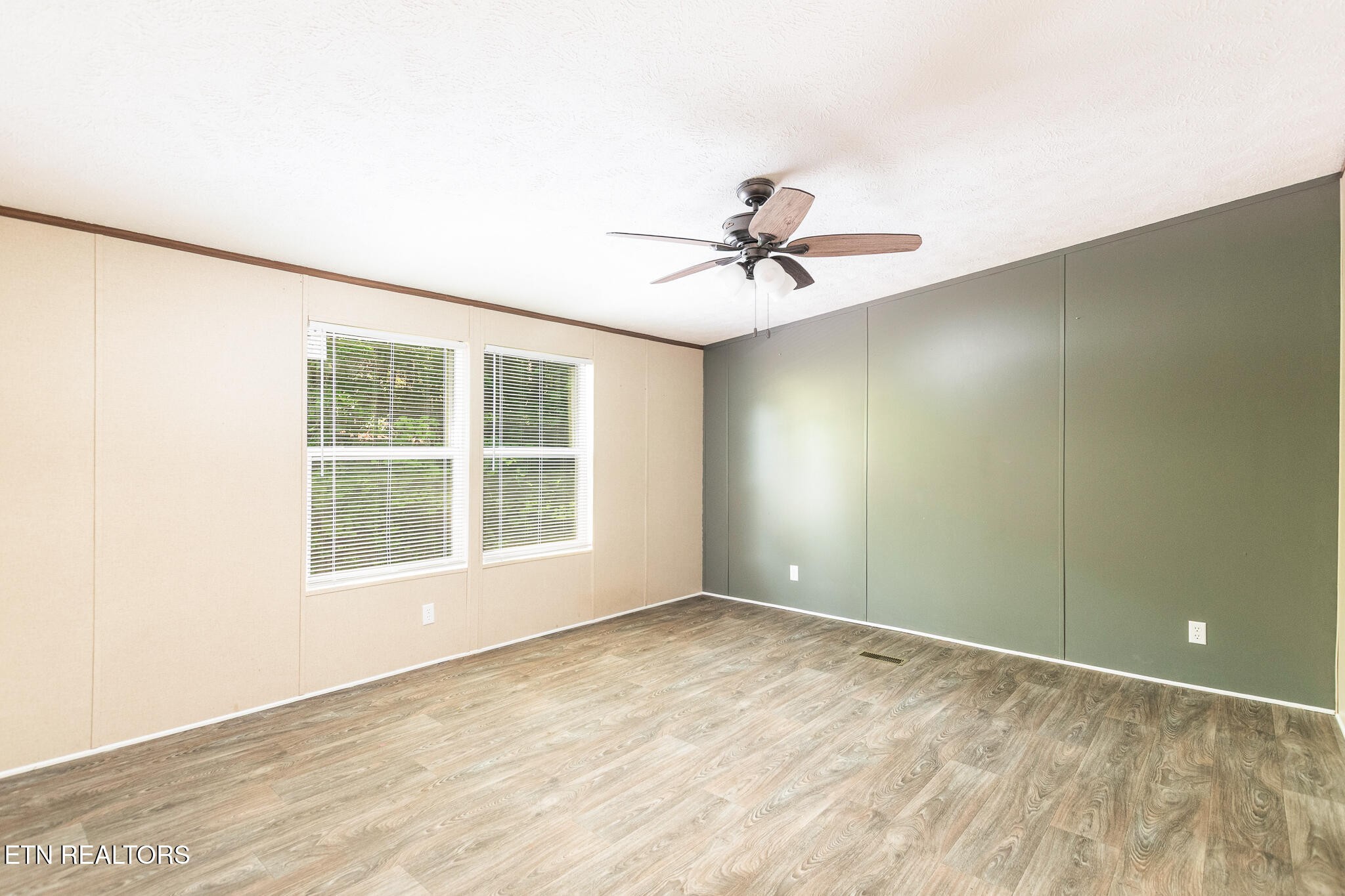 297 Wells Road Powell, TN 37849 - Photo 8 of 15 a view of an empty room with a window