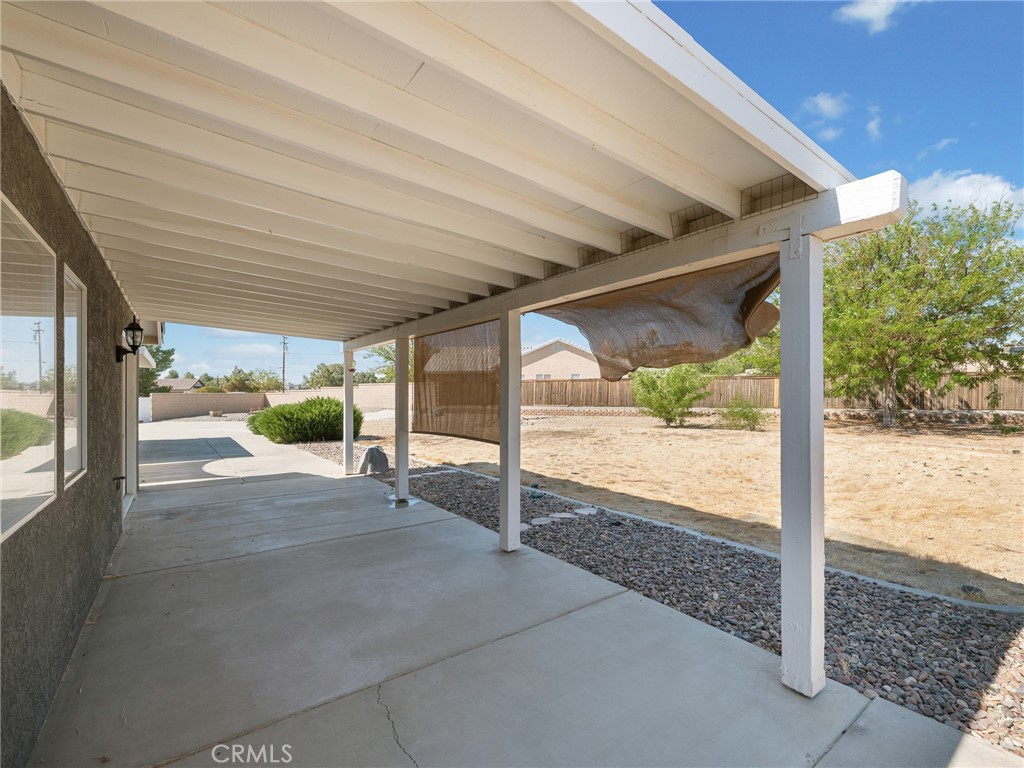 12949 Choco Road Apple Valley, CA 92308 - Photo 36 of 48 a view of a porch