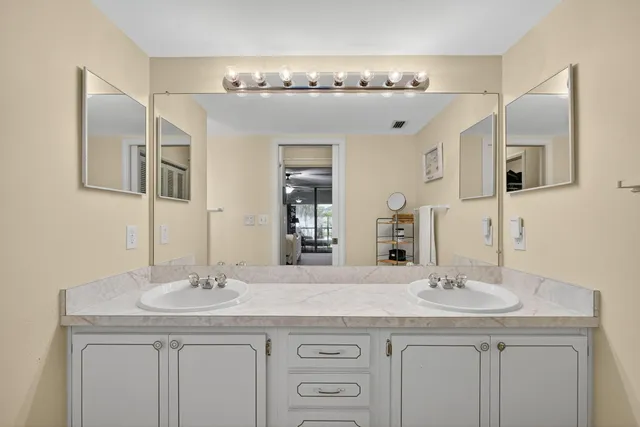 a bathroom with a toilet and a bathtub