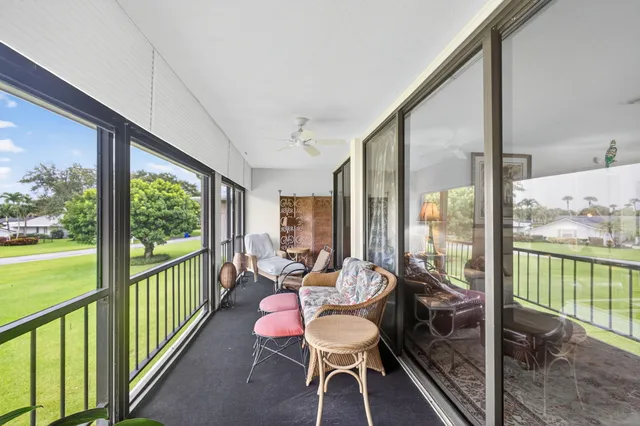 a view of a house with a yard and garage