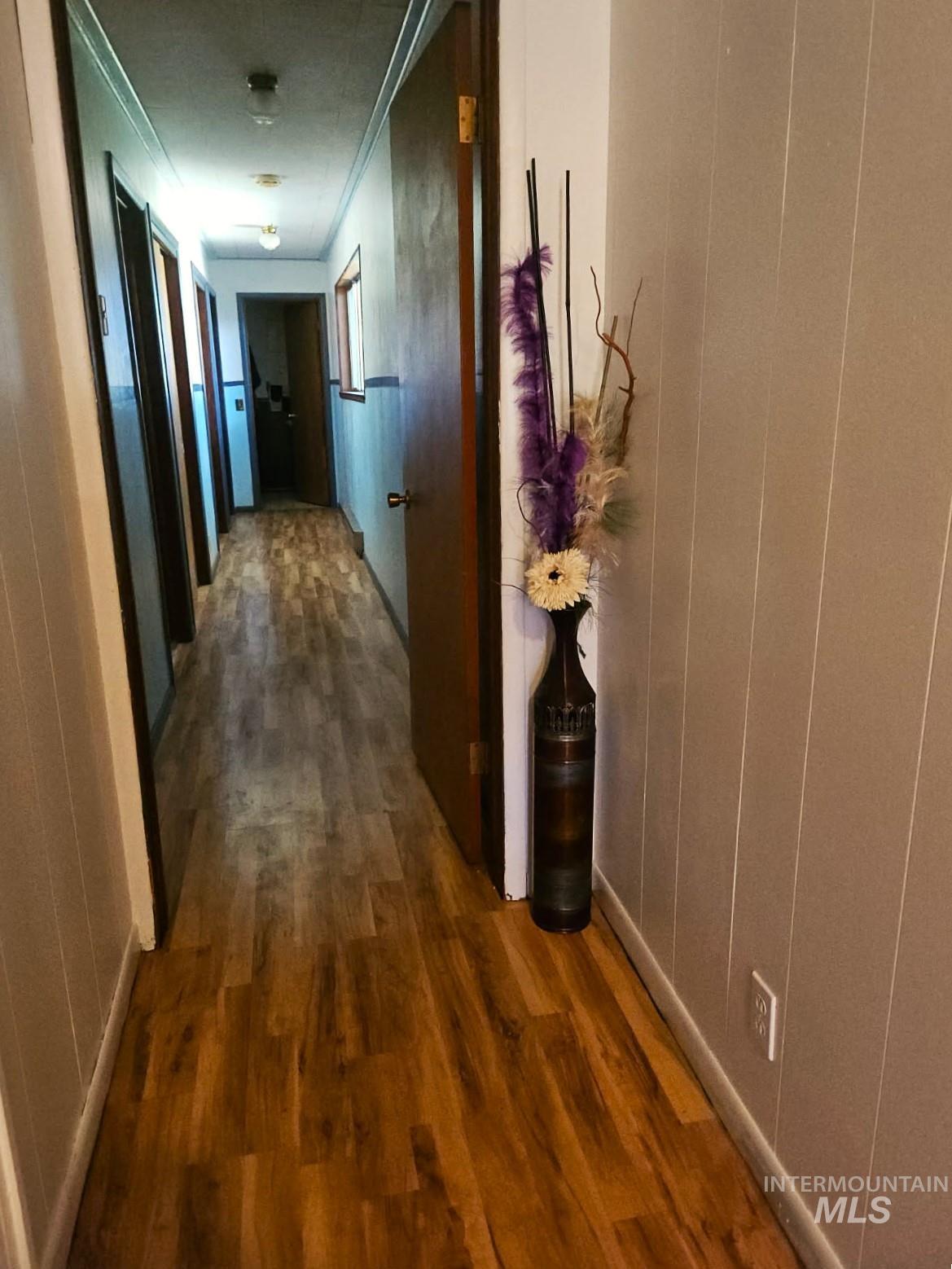 3756 Farrell Road New Meadows, ID 83654 - Photo 18 of 50 Corridor with dark wood-style floors and baseboards