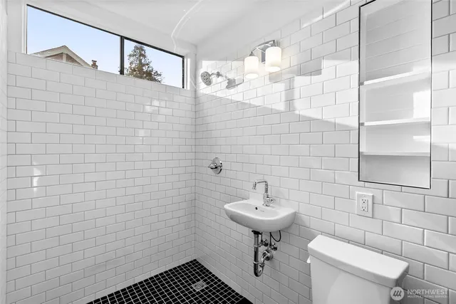 a living room with furniture and next to a window