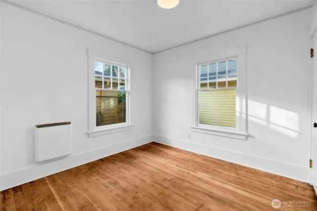 a large white bed in a white room