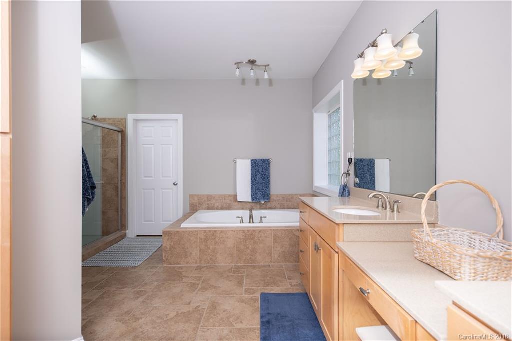 1334 Crown Ridge Drive Fort Mill, SC 29708 - Photo 12 of 25 a bathroom with a double vanity sink and a mirror