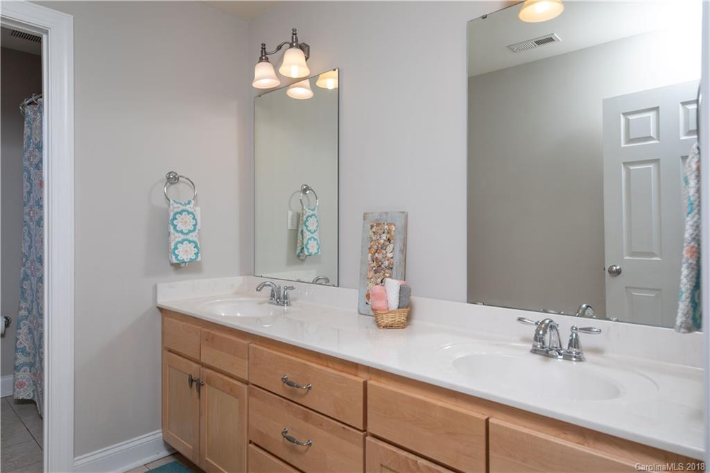 1334 Crown Ridge Drive Fort Mill, SC 29708 - Photo 21 of 25 a bathroom with a sink double vanity and a mirror