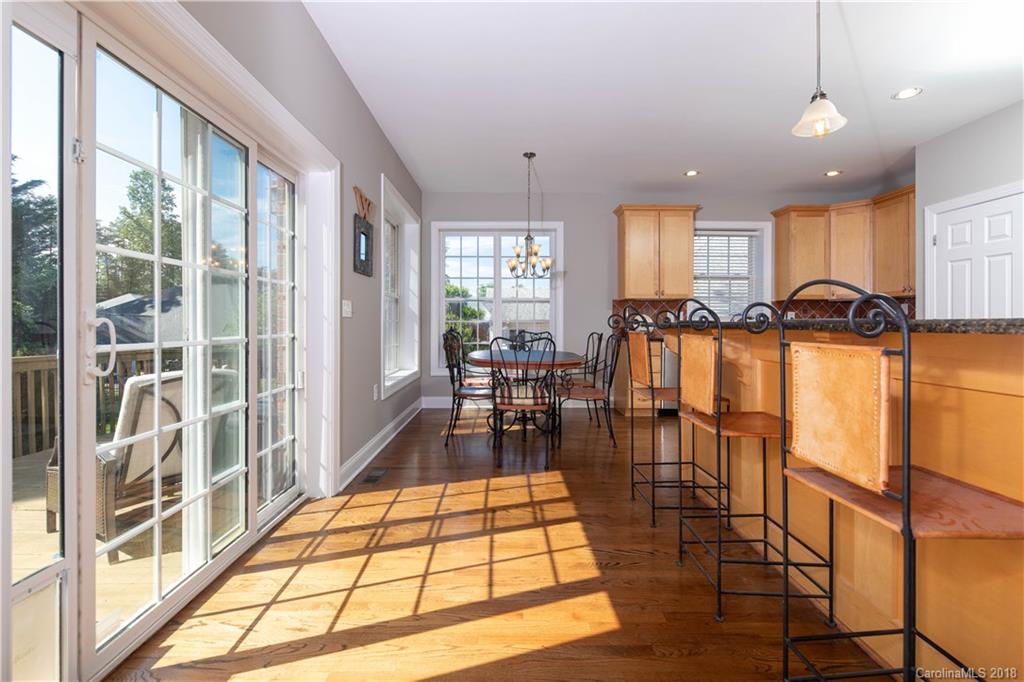 1334 Crown Ridge Drive Fort Mill, SC 29708 - Photo 5 of 25 a living room with furniture floor to ceiling window and floor to ceiling window