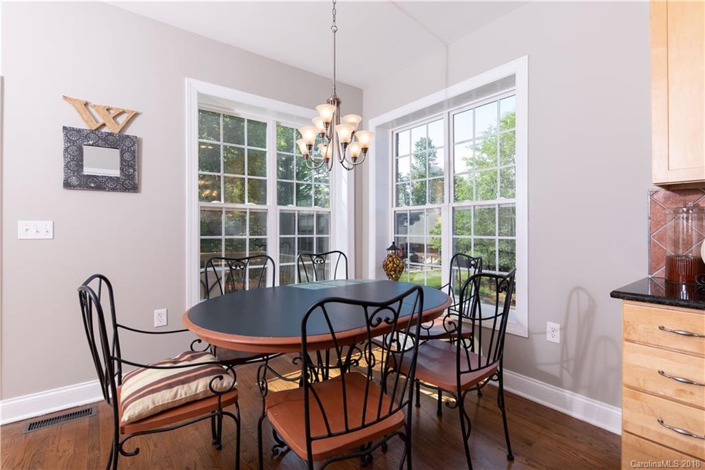 1334 Crown Ridge Drive Fort Mill, SC 29708 - Photo 6 of 25 a view of a dining room with furniture window and outside view
