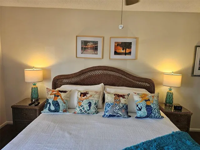 a bedroom with a bed and dresser