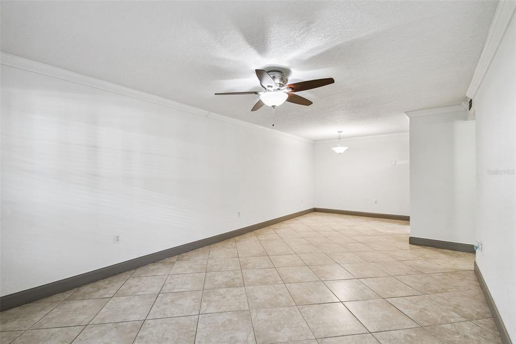 5221 Bayshore Boulevard, Unit 21 Tampa, FL 33611 - Photo 6 of 21 wooden floor in an empty room