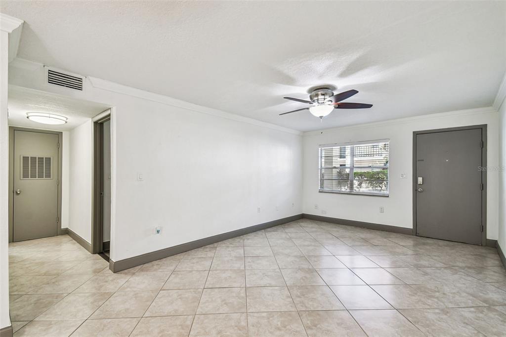 5221 Bayshore Boulevard, Unit 21 Tampa, FL 33611 - Photo 8 of 21 a view of an empty room with a window