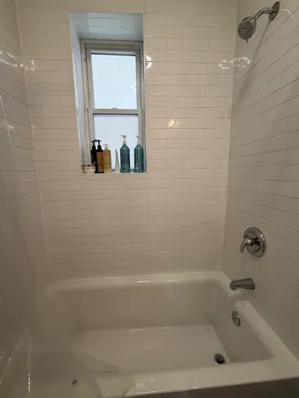 a close up of a bathtub