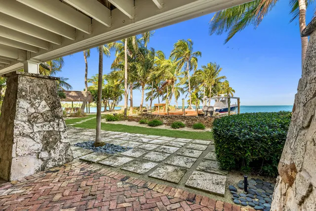 a view of balcony with wooden floor