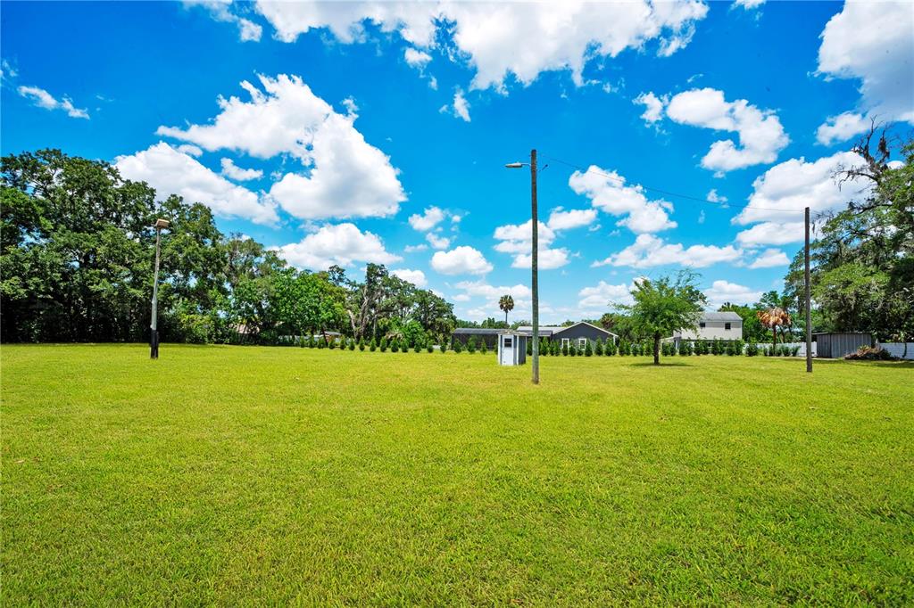 5785 Gilliam Road Orlando, FL 32818 - Photo 87 of 100 a view of an ocean house swimming pool and outdoor space
