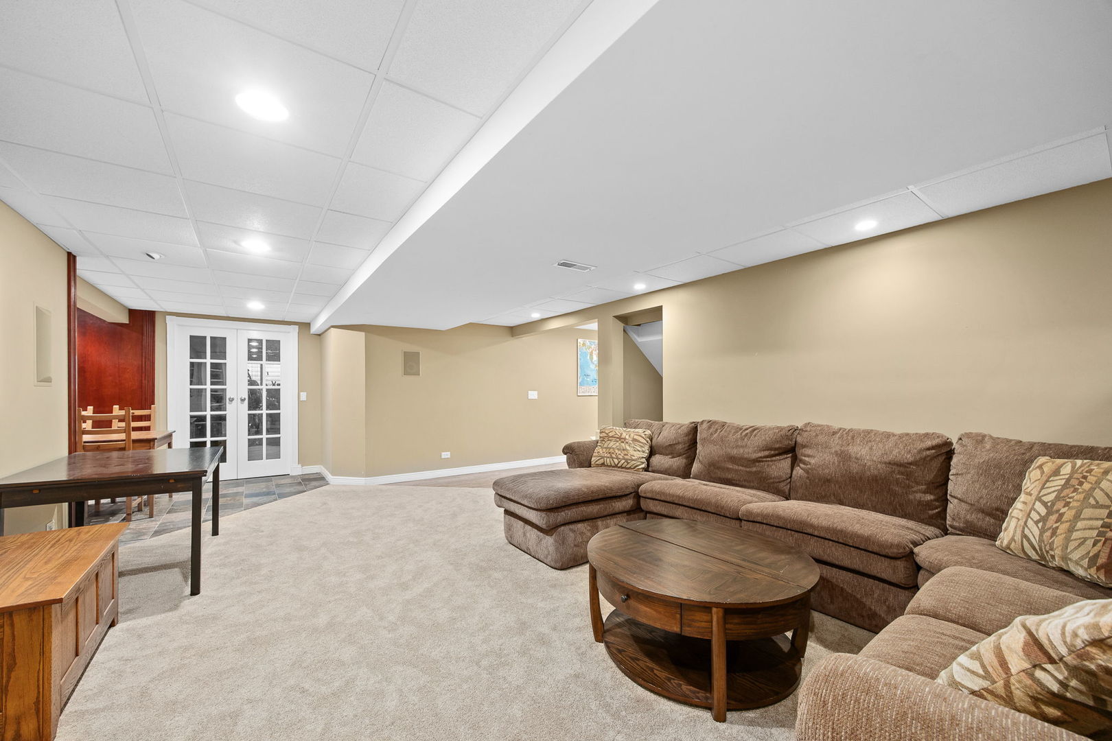 2816 Cordgrass Road Naperville, IL 60564 - Photo 31 of 49 a living room with furniture and a flat screen tv