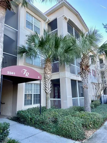a front view of a house with a garage