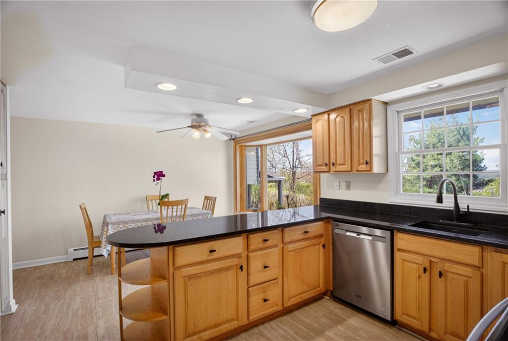 1768 Taper Drive Pittsburgh, PA 15241 - Photo 14 of 48 a kitchen with granite countertop a sink cabinets and window
