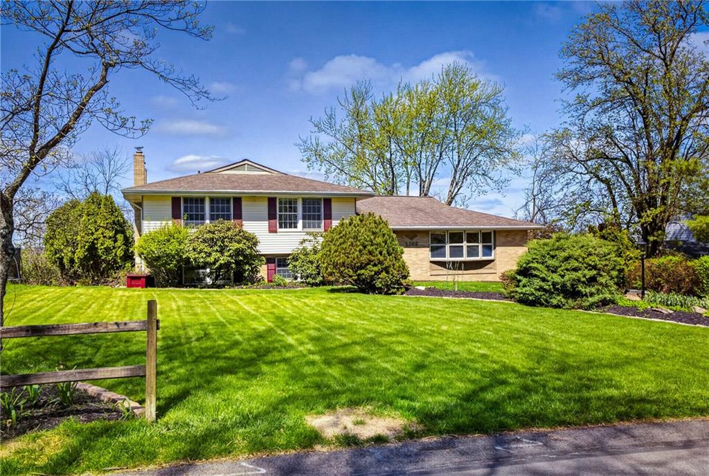 1768 Taper Drive Pittsburgh, PA 15241 - Photo 2 of 48 a front view of a house with a yard