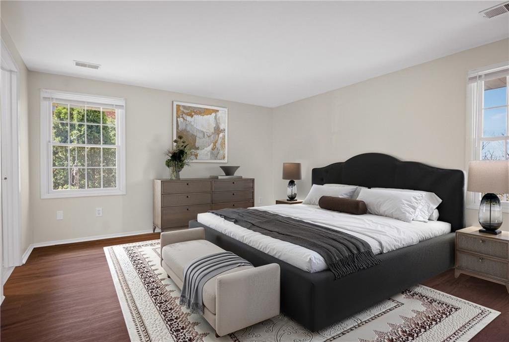 1768 Taper Drive Pittsburgh, PA 15241 - Photo 22 of 48 a bedroom with a bed and wooden floor